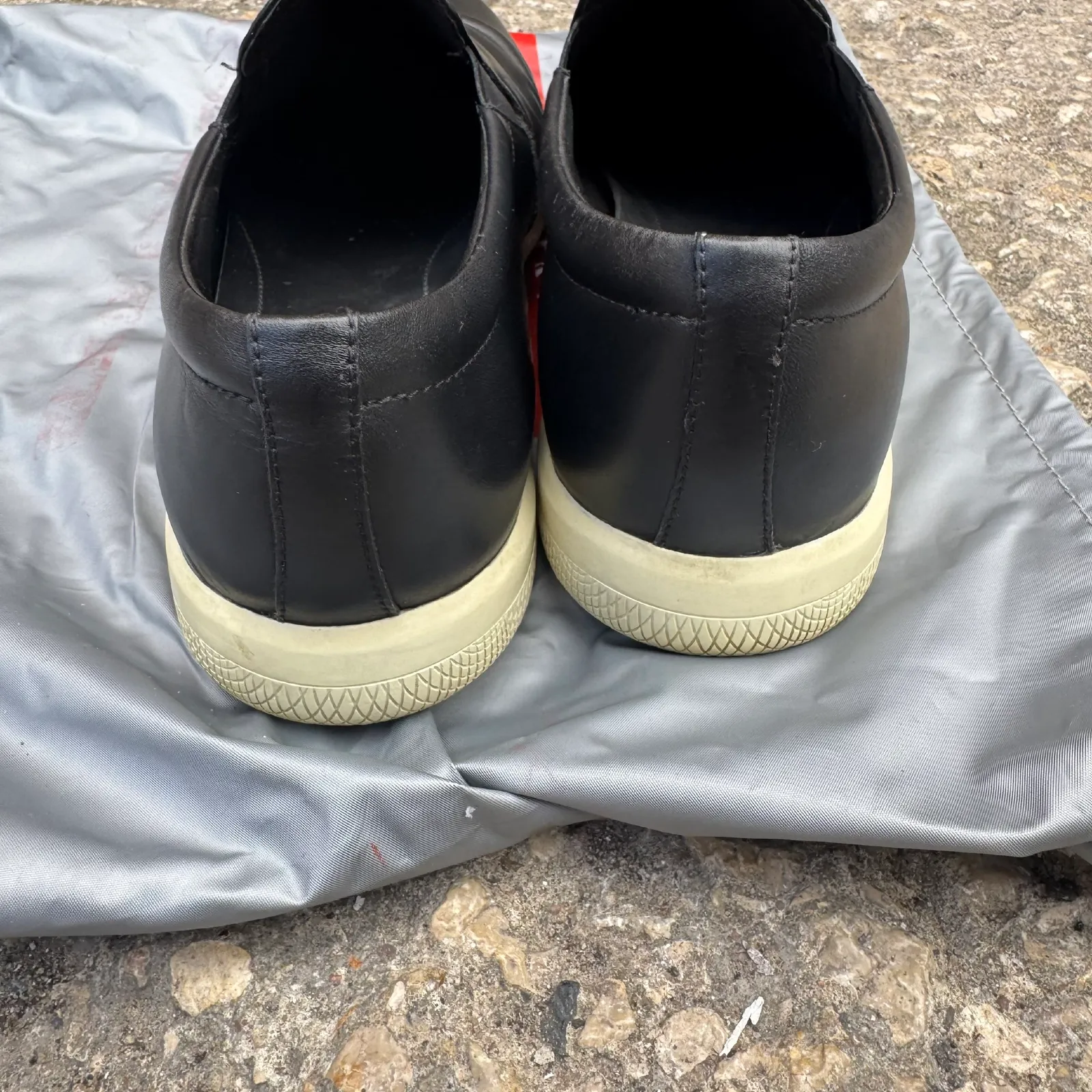 Prada Black Leather Slip-On Sneakers
